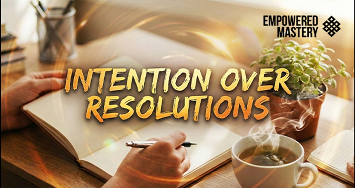 Journal with "Intention Over Resolutions" text, tea, pen, and plant. Empowered Mastery logo.