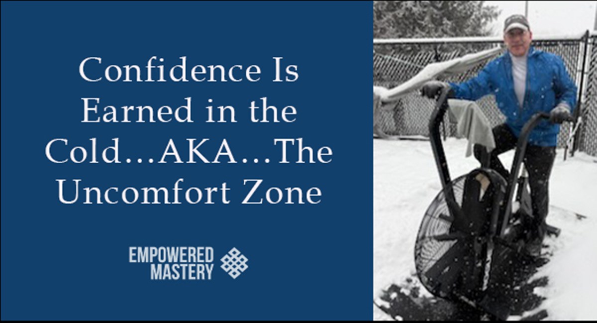 Chris on exercise bike in snow; "Confidence Is Earned in the Cold...AKA...The Uncomfort Zone" text overlay. Empowered Mastery logo.